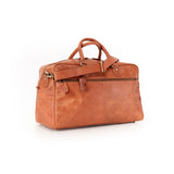 The Leather Duffle Bag Regent by Vintage Leather Sydney, shown against a white background, features double handles, a detachable shoulder strap, and an exterior zippered pocket in large brown leather.