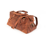 The Leather Duffle Bag Berlin by Vintage Leather Sydney is a brown leather bag with handles, shoulder strap, zippered pockets, and gold-tone hardware, shown on a white background.