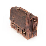 The Leather Messenger Bag Prestige by Vintage Leather Sydney is shown on a white background, featuring brown leather, brass buckles, a shoulder strap, and three front pockets.