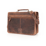 The Leather Messenger Bag Prestige by Vintage Leather Sydney features a top handle, adjustable shoulder strap, and front zipper pocket. Its rustic brown leather and upright design offer timeless style and daily practicality.