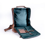 The Leather Travel Backpack Ryde by Vintage Leather Sydney features an open brown leather design with green lining, showcasing organized compartments—pocket, pen loop, and document slot—against a clean white background.