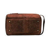 leather toiletry bag with brass fittings and handle to carry the bag.