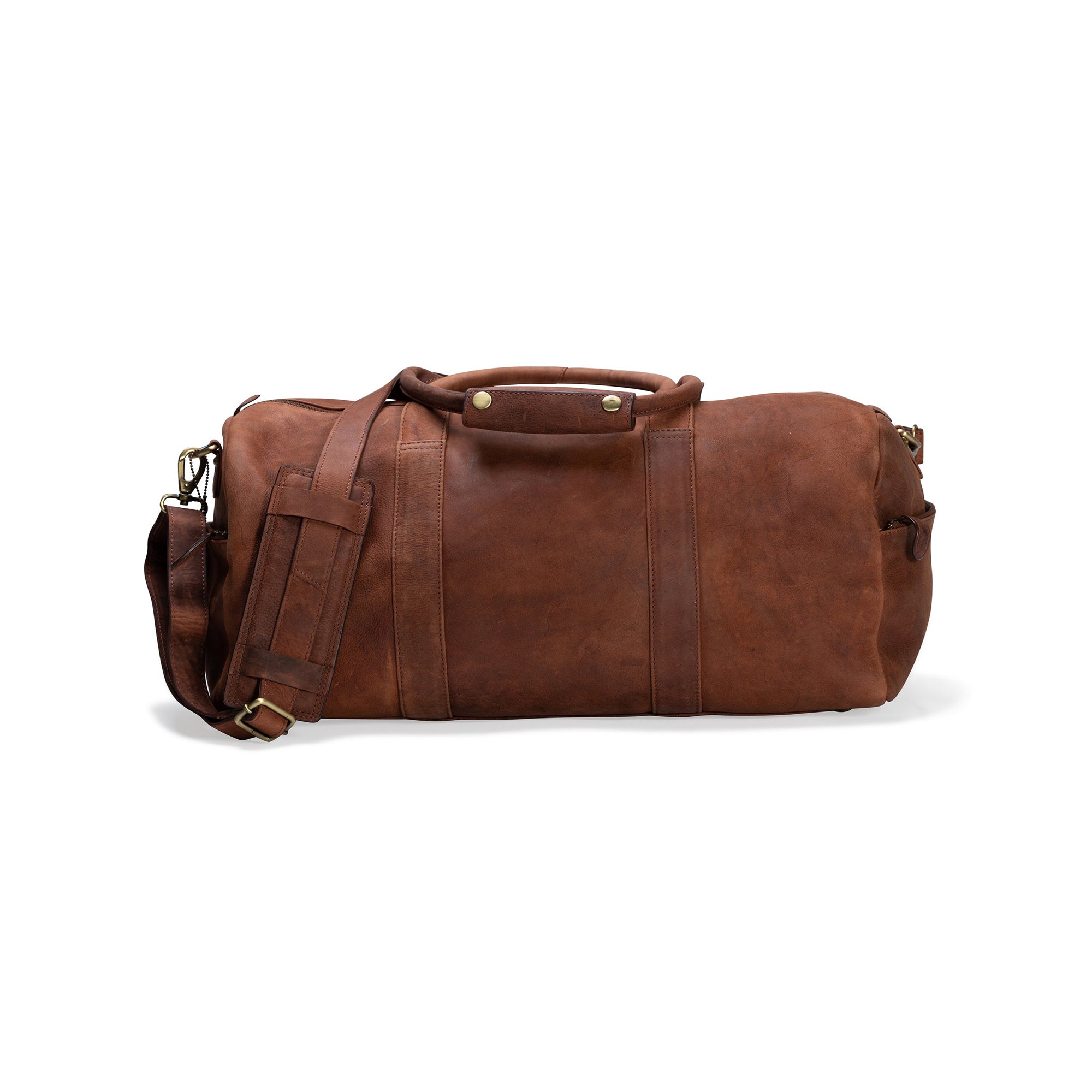 The Leather Duffle Bag - Boston from Vintage Leather features a shoulder strap, two handles, and brass hardware—its simple, classic design makes it a perfect travel bag, seen here against a white background.