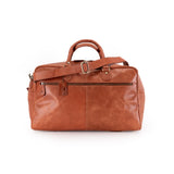 The Leather Duffle Bag Regent by Vintage Leather Sydney is a large brown bag featuring a top handle, adjustable shoulder strap, and front zipper pocket, displayed on a white background.
