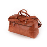 The Leather Duffle Bag Regent by Vintage Leather Sydney features brown leather, handles, a shoulder strap, front zip pocket, and gold-tone hardware, shown on a white background.