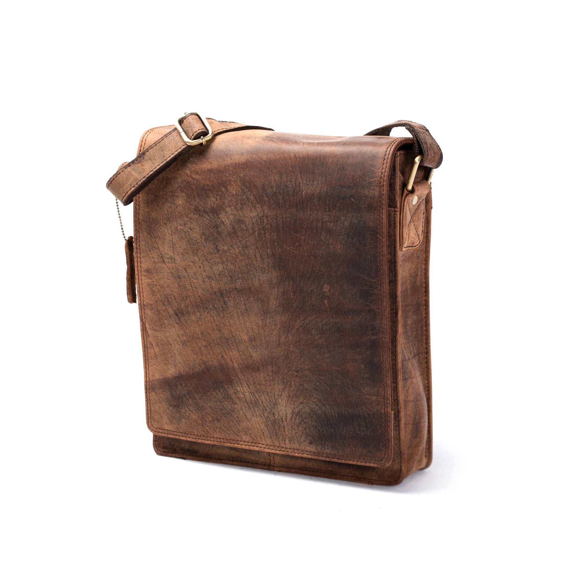 The Vintage Leather Kent Leather Satchel, shown on a white background, features a flap cover, adjustable shoulder strap, and distressed finish for a timeless vintage look.
