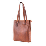 Brown leather tote bag on a white background