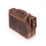 The Leather Messenger Bag Prestige by Vintage Leather Sydney features a top handle, adjustable shoulder strap, and front pocket, shown on a white background.