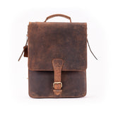 The Ryder Courier Satchel by Vintage Leather Sydney features vintage-style brown leather, a top handle, front flap, and buckle closure—ideal for those seeking classic charm with practical sophistication. Shown against a white background.