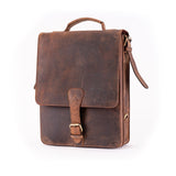 The Ryder Courier Satchel by Vintage Leather Sydney is a vintage-style brown leather bag featuring a front flap, buckle closure, top handle, and shoulder strap—ideal for those who appreciate classic design with practical style.