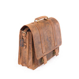 The Scout Leather Briefcase by Vintage Leather Sydney features a top handle, front buckle closures, and a luggage tag, shown against a white background.