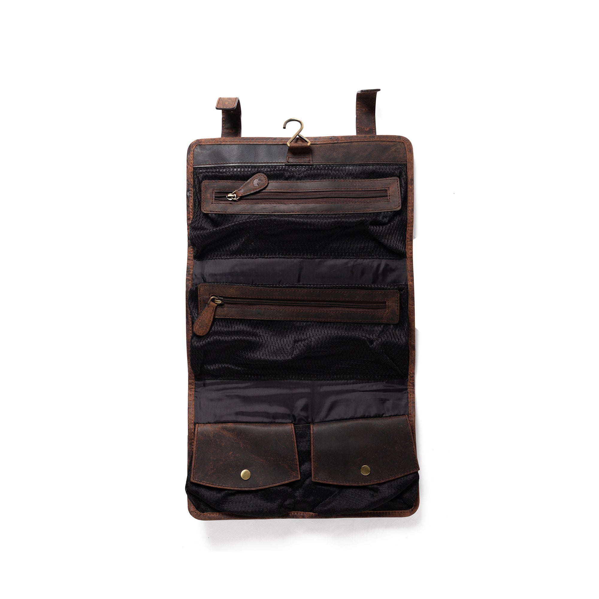 The Leather Hanging Toiletry Bag Rio by Vintage Leather Sydney is open and hanging, showing zippered mesh compartments and snap-button pouches—an essential travel accessory against a white background.