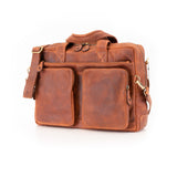 The Leather Messenger Bag Zenith by Vintage Leather Sydney features two front zippered pockets, a shoulder strap, and gold-tone hardware, shown on a white background.